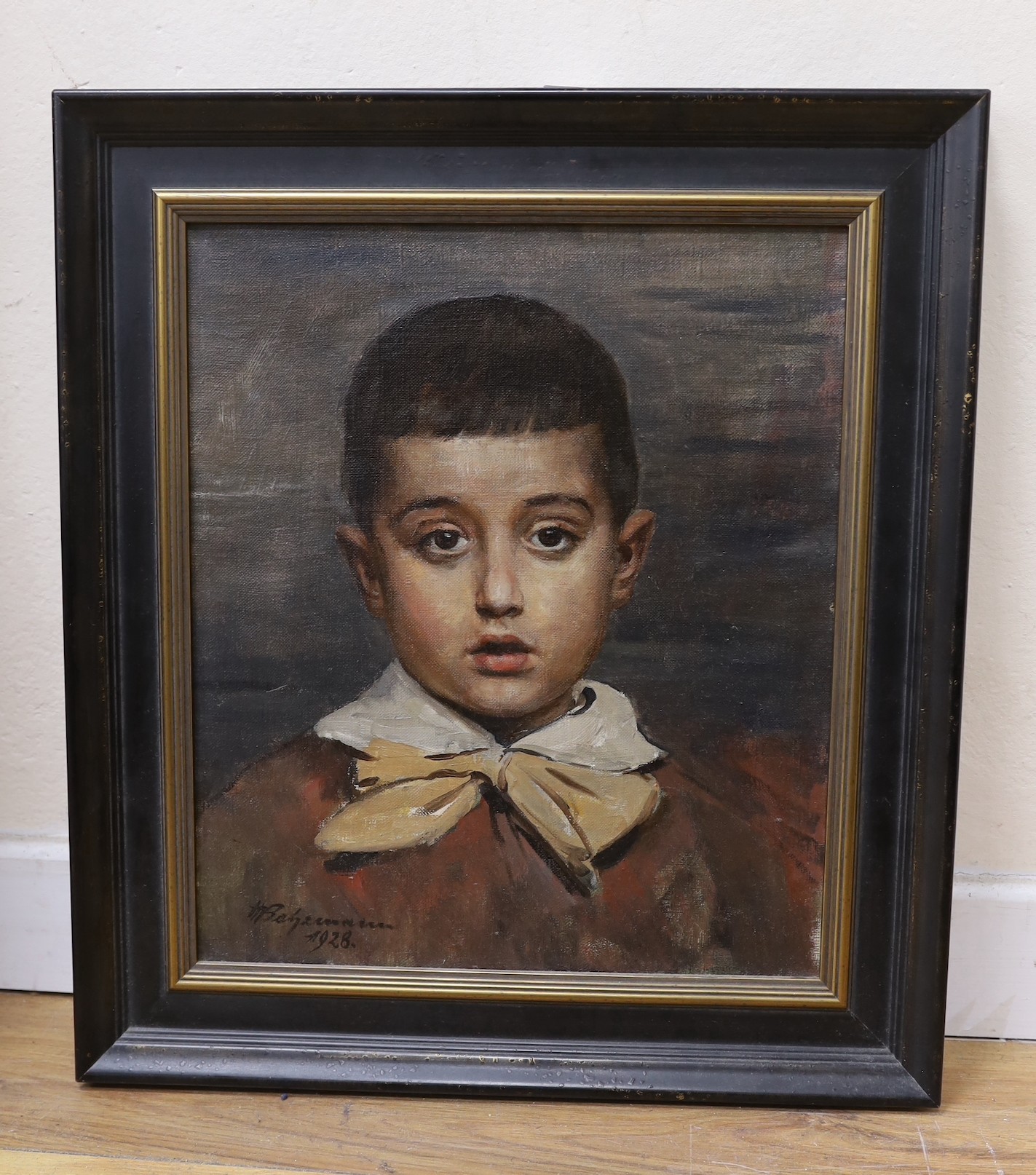 German School, oil on canvas, portrait of a young boy, indistinctly signed and dated 1928, 39 x 33cm.